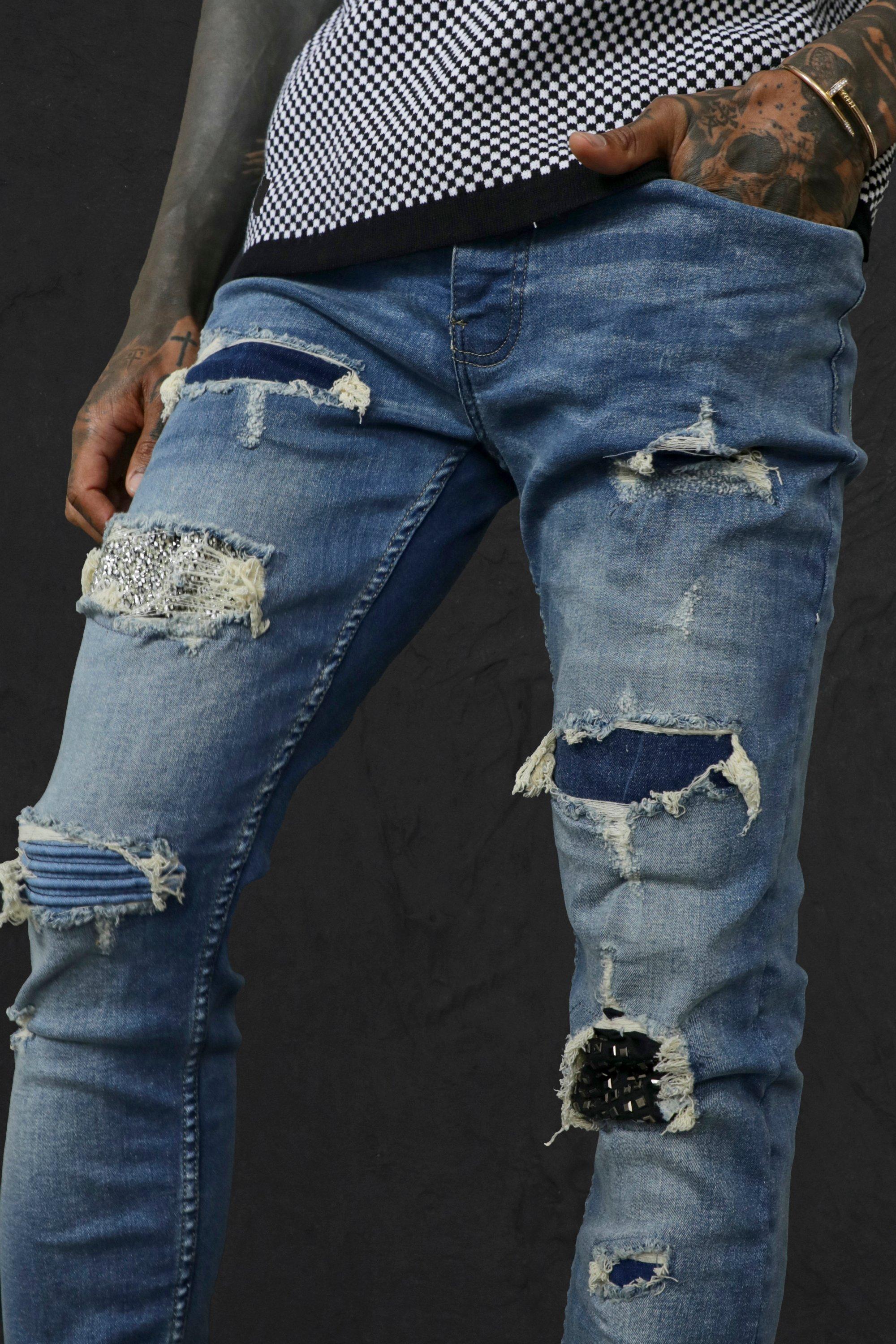 Jeans uomo 2025 con strappi